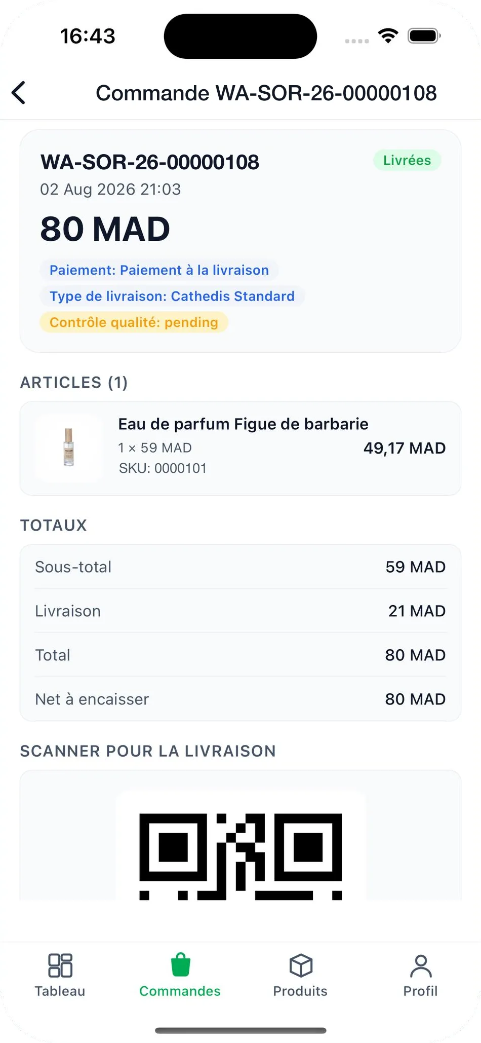 Order detail in the Wasal seller app: status, payment method, delivery type, items, totals including net payable, and the code to scan when handing the parcel to the courier